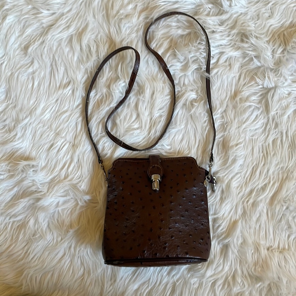 Brown leather clutch